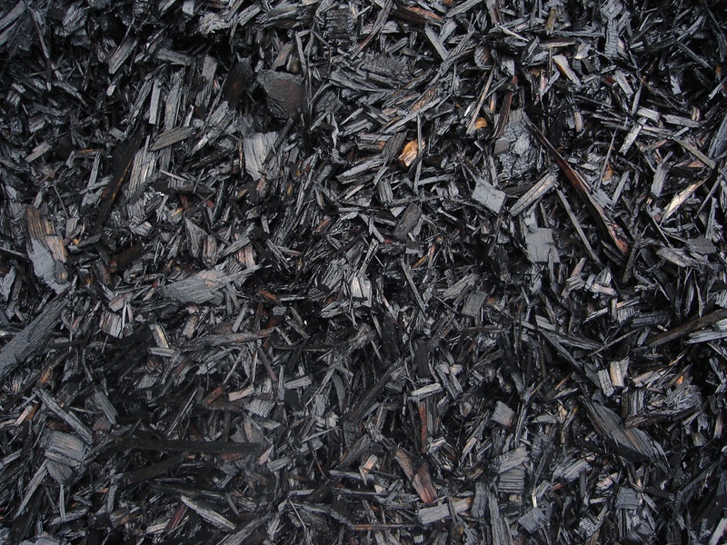 Black wood chips hastie s capitol sand and gravel rock Black wood chips hastie s capitol sand and gravel rock